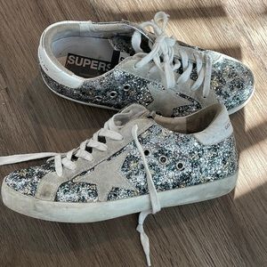Golden goose sneakers size 7, used but still in great condition.